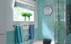 Уютный интерьер голубой ванной комнаты
